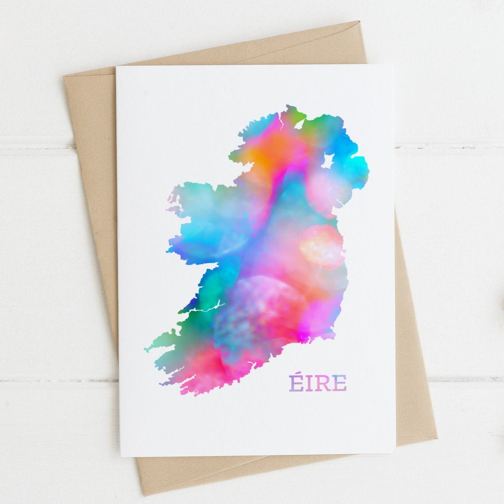 colorful tie dye printed ireland greeting card on brown envelope with white wooden backdrop